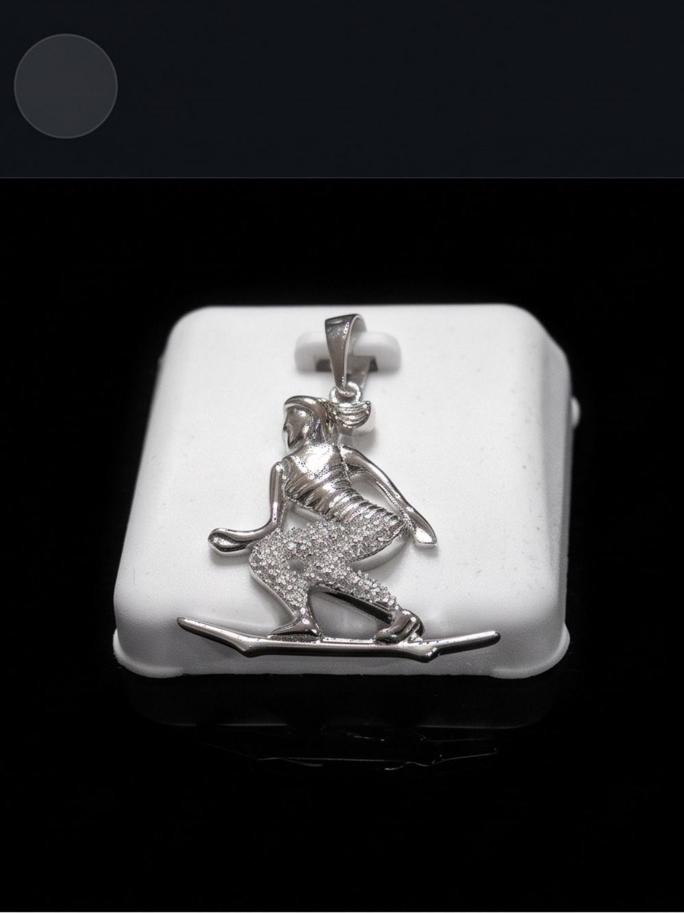 925 Sterling silver masonite pendant .5 CTW skiing woman